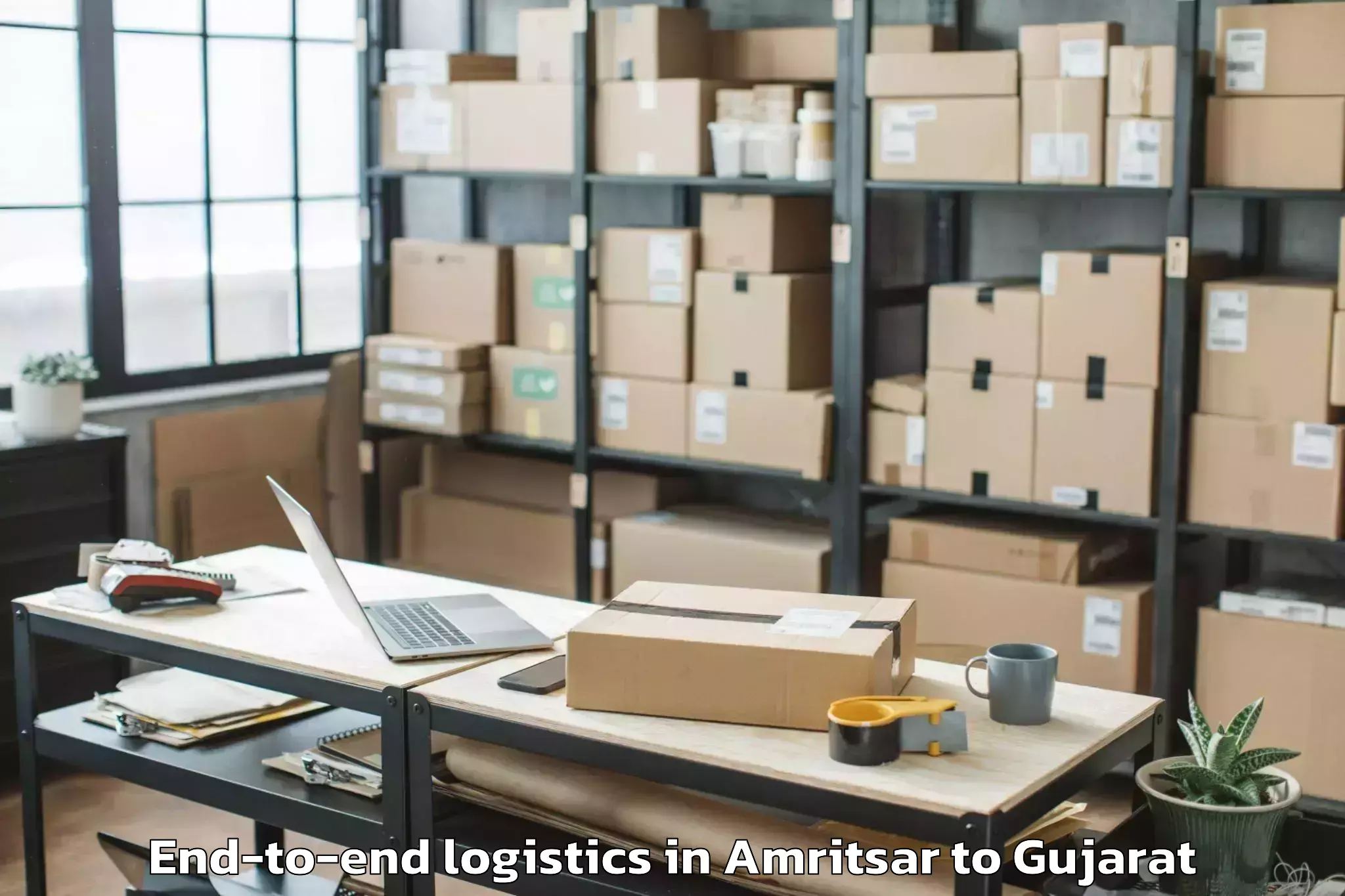 Reliable Amritsar to Vaghodia Ina End To End Logistics